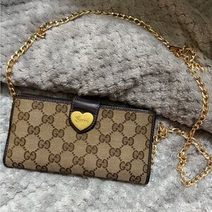 Gucci heart canvas continental wallet